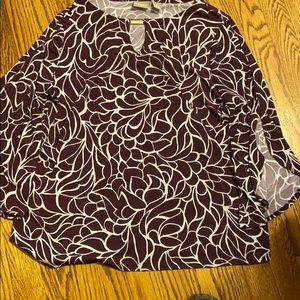 Top with peep hole sleeves